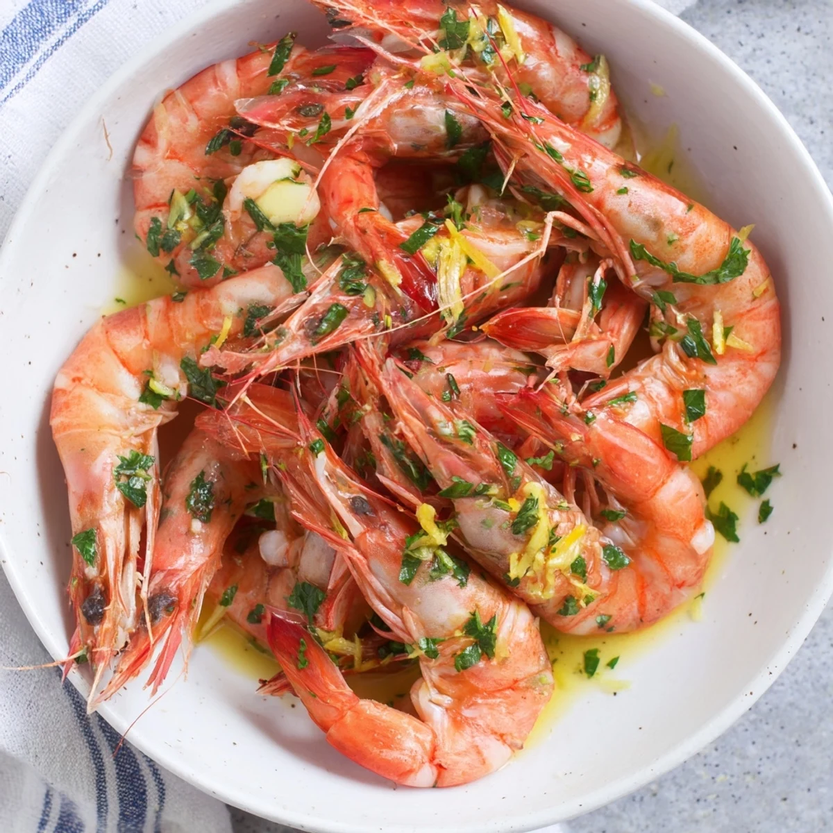 Enjoy the light and flavorful Lemon Herb Shrimp Scampi, a Mediterranean-inspired dish for your plate.