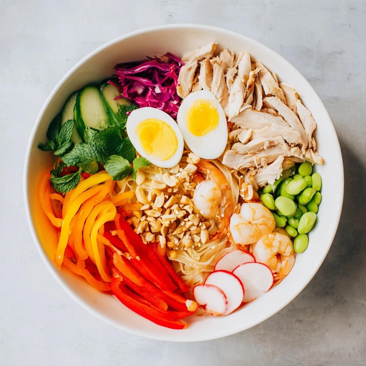 Vibrant Asian Fusion Noodle Bowl Board: a beautiful sharing platter with colorful vegetables, perfect for entertaining.