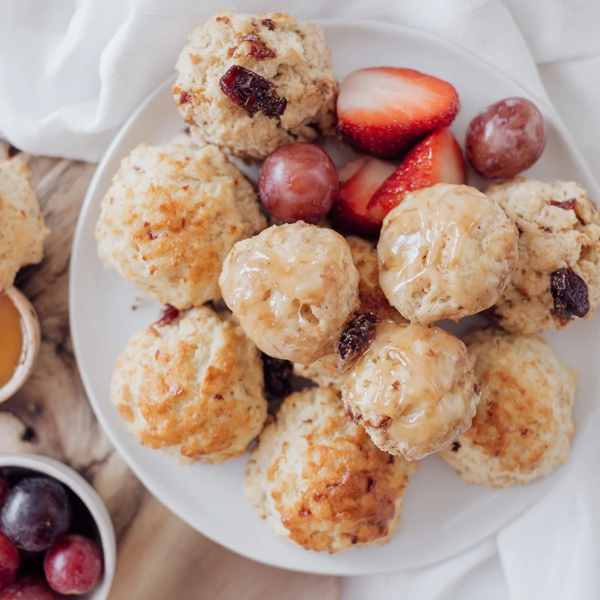 A beautifully arranged Breakfast Brunch Board Bliss, featuring fluffy mini pancakes and fresh fruit.