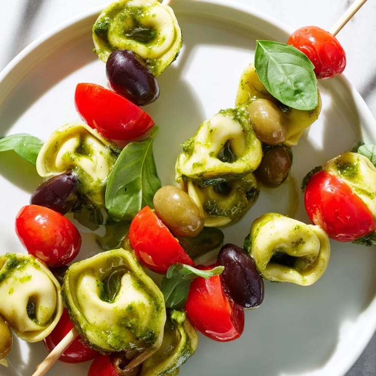 Enjoy the visually appealing Appetizer Skewers with tortellini, perfect for your next gathering or party.