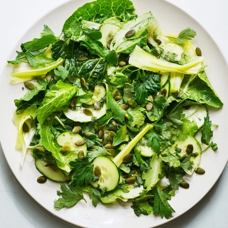Tossed Glowing Green Salad with hydrating vegetables, parsley, and lemony dressing, perfect as a light vegan side.